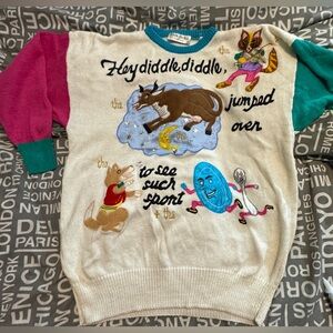 Woman’s gently worn Hey Diddle Diddle theme embroidered sweater